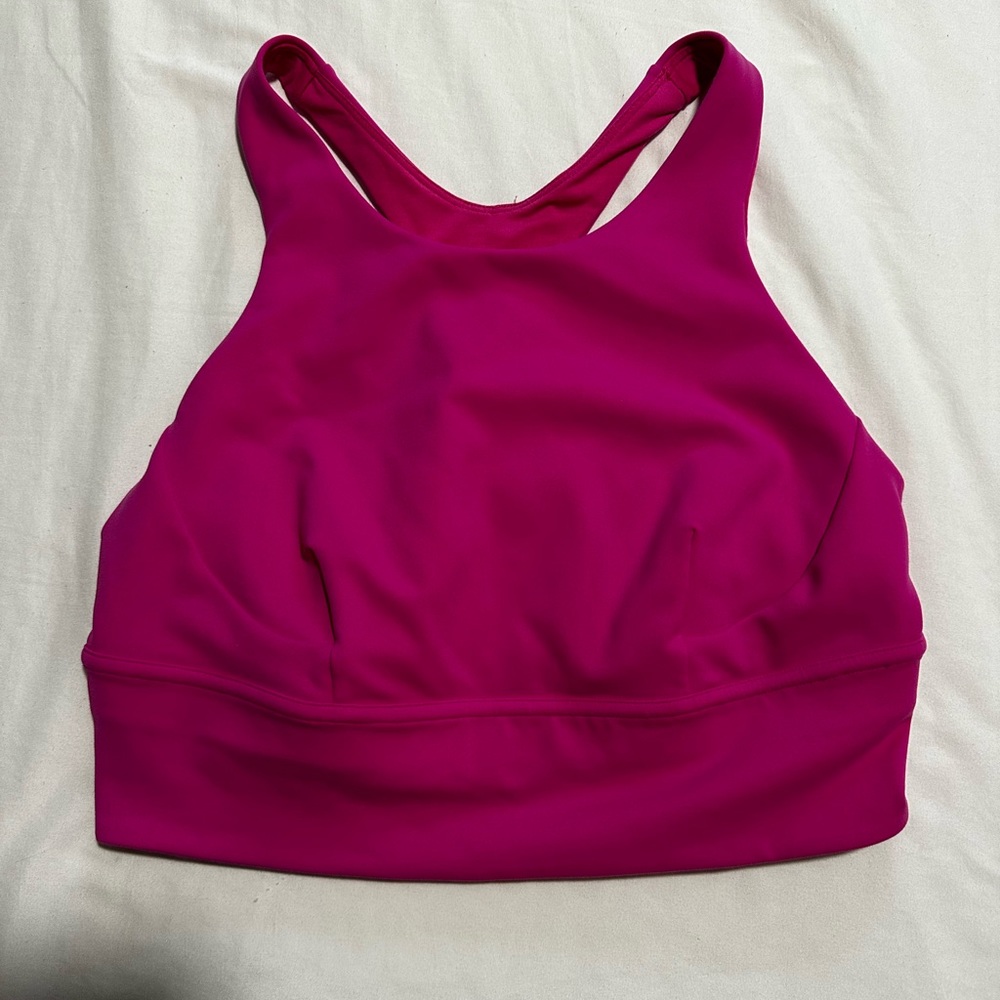 lululemon wunder train racerback tank in pink with no visible marks or stains